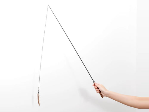 The Chaser held at full length, the Wren hanging from its cord