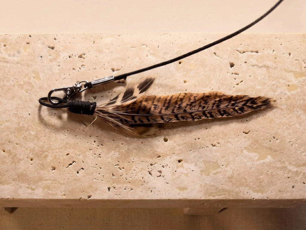 The Wren - hand-tied undyed pheasant feathers on a Dyneema cord