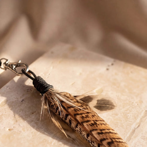 The Wren's clasp and cord wrap, close up